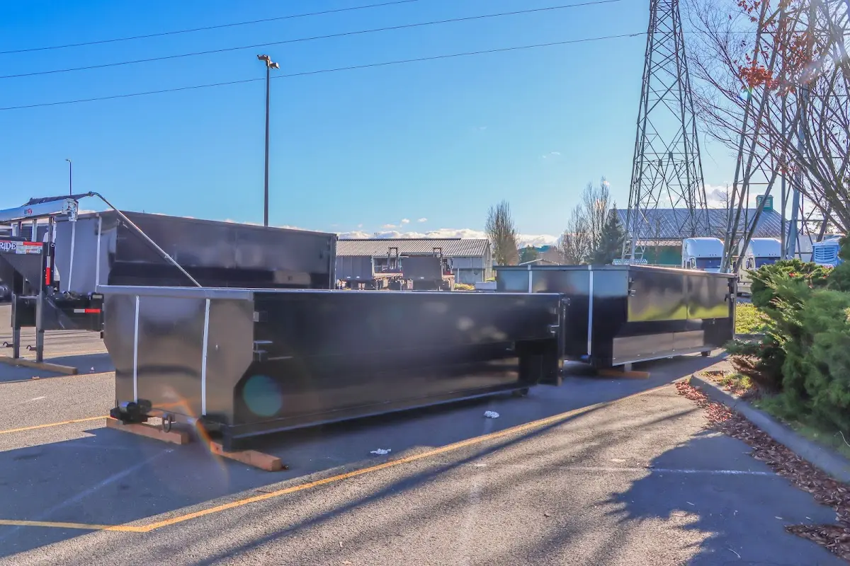 Roll-off dumpster ready for waste disposal at job site for 6 Yard Dumpster Rental in Washington